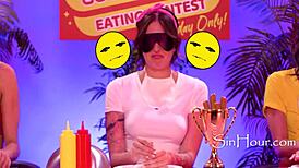 Dkye soaks her strapon at a wild hotdog eating contest.