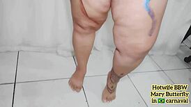 bbw hotwife swinger mary butterfly dances in brazilian carnaval showing saggy tits and nipples.