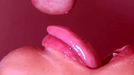 This Japanese wife is cheating with a monster cock in a close-up blowjob scene.