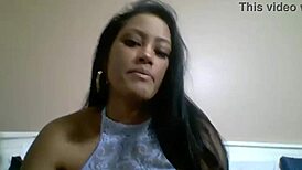 What huge toy does Maxine X slide deep in her slit?