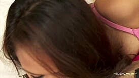 interracial boy and girl couple have some fun in the bedroom