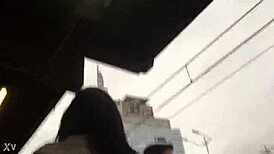 Jacket and boots candidly exposed on the train street scene.