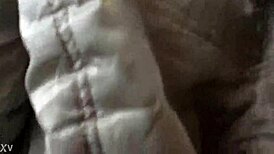 Jacket and boots candidly exposed on the train street scene.