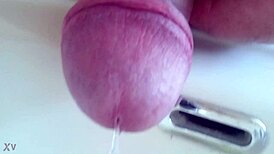 She pisses in the sink, close-up view