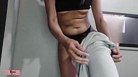 Nini tries on leggings, showing off her sexy petite figure