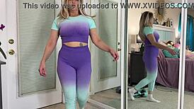 sexy milf tabithaxxx tries on tight gym leggings in bedroom, flashing curvy body and big natural tits for pov fans during sfw haul.