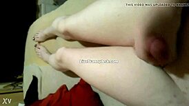 damn, check this shemale spilling cum on legs and feet!