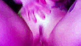 She grips the dildo tightly, clothes ripping as she rides and drips with pleasure.