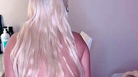 Blonde with huge oiled tits twerks her massive buttocks.