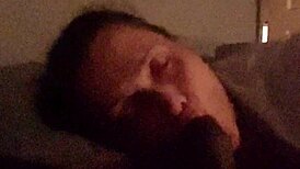 going wild sucking this beautiful big black cock in the bedroom.