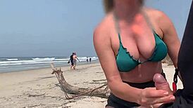 public beach handjob by busty babe until massive cumshot pov
