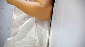 chubby babe, playing with her big tits gets her pussy soaked!