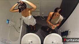 Two pornstars perform softly in the bathroom for voyeurs