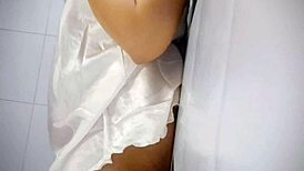 chubby babe, playing with her big tits gets her pussy soaked!