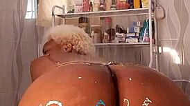 Ruzzyde fucks in the bathroom with dildo