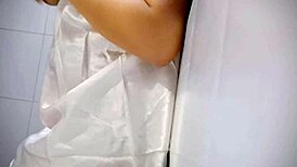 chubby babe, playing with her big tits gets her pussy soaked!