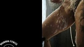 the redhead cowgirl shaves her pussy in the shower, making it smooth and wet