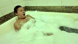 fucking a 58-year-old brazilian lady hard in the foamy jacuzzi with big cock