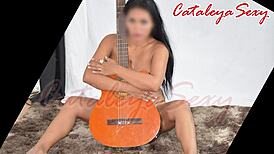 Hey, check out this model posing in sexy outfits and naked with a guitar, so sensual!