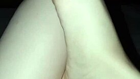 a slut shows her bare feet in the dark