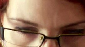 European redhead on knees sucking wrapped cock hungrily