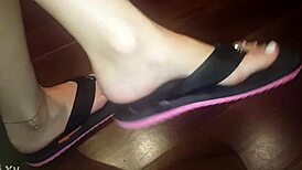 luh gives a footjob with her feet