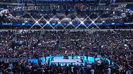 rhea ripley battles charlotte flair in a intense wrestling match at wrestlemania