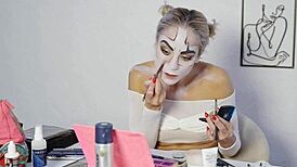 Pretty blonde does Harley Quinn makeup tutorial for Halloween