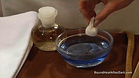 The busty naked lesbian slave gets fingered by her mistress