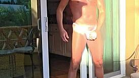 Wow, Papifachero stretches thongs on his balcony during vacation!