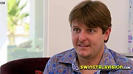 Conservative couple at the swing mansion party, having fun.