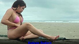 Hey, this brunette latina couple disguises as bathers and fucks doggystyle on the beach sand 😏