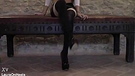 Milf In Leather Miniskirt And Stockings Sits Seductively.