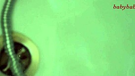 Breastmilk flows beautifully from cute lactating mommy in intimate homemade scene.