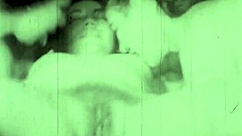 Vintage lesbians confess erotic secrets in a steamy retro threesome scene.