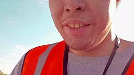 Asian amateur walks around outdoors during work