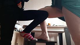 middle aged woman and student masturbate together on chairs