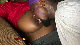 just chilling, sucking on her massive ebony tits today