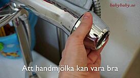 Breastmilk flows beautifully from cute lactating mommy in intimate homemade scene.