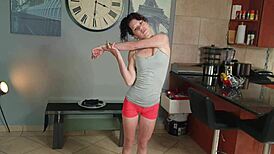 Desperate woman pisses in tight pants during stretches