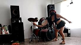 Neighbors Play Drums As She Strips And Shakes Her Huge Ass