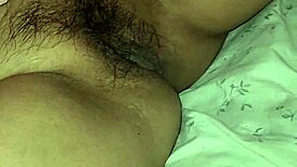 Brunette with hairy pussy shows off her beaver