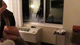 having fun in see through dress at hotel