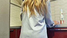 Hot girl cleans the stove, shows her big ass and tits, then masturbates passionately