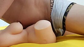 young man with a big carrot fucking his sex doll - my big cock