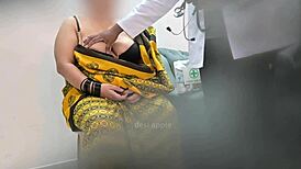 doctor examines patient in clinic setting