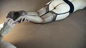 Does the horny milf get a soles massage in stockings?