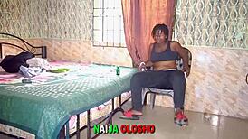 Naija Babe Undresses for Pussy Examination with Cucumber