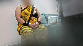 doctor examines patient in clinic setting