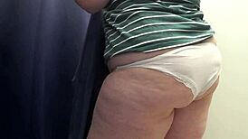 Big ass milf tries on tight leggings in the fitting room